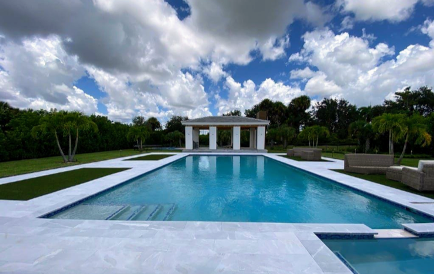 Luxury custom concrete pool built by CAM in Tampa Bay